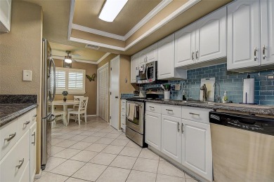 A true gem nestled in the GATED COMMUNITY of East Lake Woodlands on Emerald Greens Golf Resort and Country Club in Florida - for sale on GolfHomes.com, golf home, golf lot