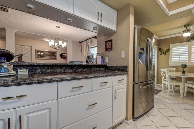 A true gem nestled in the GATED COMMUNITY of East Lake Woodlands on Emerald Greens Golf Resort and Country Club in Florida - for sale on GolfHomes.com, golf home, golf lot