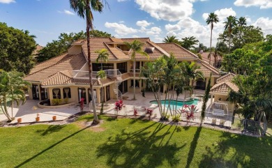 Experience unparalleled elegance in the heart of Boca Grove! on Boca Grove Golf and Tennis in Florida - for sale on GolfHomes.com, golf home, golf lot