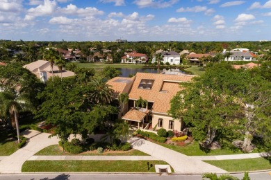 Experience unparalleled elegance in the heart of Boca Grove! on Boca Grove Golf and Tennis in Florida - for sale on GolfHomes.com, golf home, golf lot