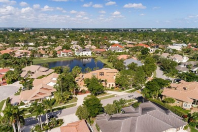 Experience unparalleled elegance in the heart of Boca Grove! on Boca Grove Golf and Tennis in Florida - for sale on GolfHomes.com, golf home, golf lot