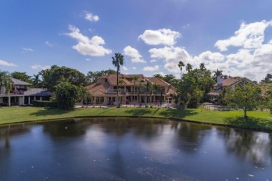 Experience unparalleled elegance in the heart of Boca Grove! on Boca Grove Golf and Tennis in Florida - for sale on GolfHomes.com, golf home, golf lot