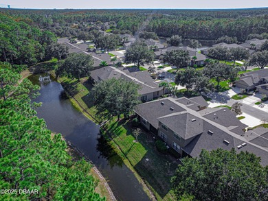 Welcome home to this 2 bedroom, 3 full bath townhome in on Plantation Bay Golf and Country Club in Florida - for sale on GolfHomes.com, golf home, golf lot