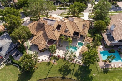 Experience unparalleled elegance in the heart of Boca Grove! on Boca Grove Golf and Tennis in Florida - for sale on GolfHomes.com, golf home, golf lot