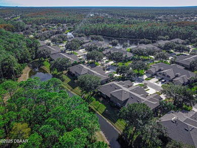 Welcome home to this 2 bedroom, 3 full bath townhome in on Plantation Bay Golf and Country Club in Florida - for sale on GolfHomes.com, golf home, golf lot