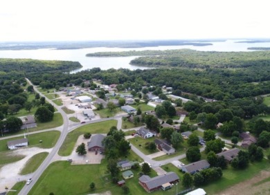 Golf Course & Lake Retreat in Stockton, MO!MOTIVATED SELLERS; on Stockton Country Club in Missouri - for sale on GolfHomes.com, golf home, golf lot