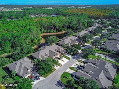 Welcome home to this 2 bedroom, 3 full bath townhome in on Plantation Bay Golf and Country Club in Florida - for sale on GolfHomes.com, golf home, golf lot