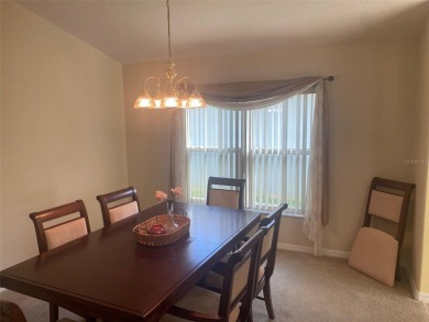 This 1,489 square foot is awaiting your updates. Enter through on Tampa Bay Golf and Country Club in Florida - for sale on GolfHomes.com, golf home, golf lot