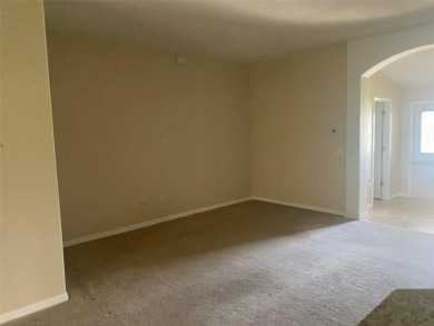 This 1,489 square foot is awaiting your updates. Enter through on Tampa Bay Golf and Country Club in Florida - for sale on GolfHomes.com, golf home, golf lot
