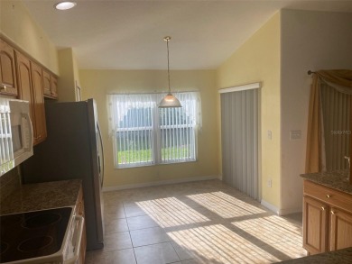 This 1,489 square foot is awaiting your updates. Enter through on Tampa Bay Golf and Country Club in Florida - for sale on GolfHomes.com, golf home, golf lot