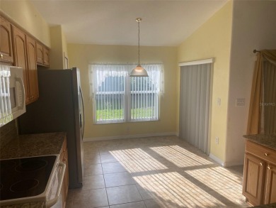 This 1,489 square foot is awaiting your updates. Enter through on Tampa Bay Golf and Country Club in Florida - for sale on GolfHomes.com, golf home, golf lot