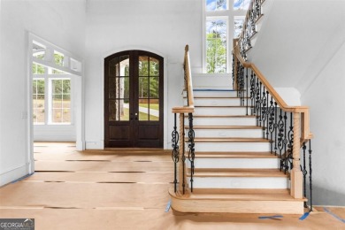 Another enviable custom golf estate built by Walden Signature on Reynolds Lake Oconee - The Oconee in Georgia - for sale on GolfHomes.com, golf home, golf lot
