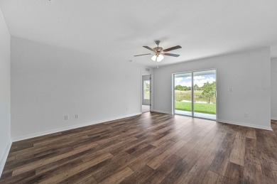 The beautiful Amelia plan by LGI Homes is located within the on Royal Tee Country Club in Florida - for sale on GolfHomes.com, golf home, golf lot