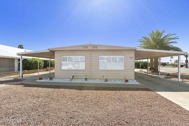 Enjoy easy living in this beautifully maintained 2BR/2BA on Fountain of the Sun Country Club in Arizona - for sale on GolfHomes.com, golf home, golf lot