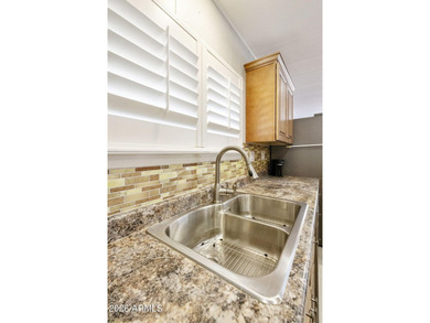 Enjoy easy living in this beautifully maintained 2BR/2BA on Fountain of the Sun Country Club in Arizona - for sale on GolfHomes.com, golf home, golf lot