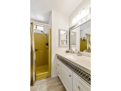 Enjoy easy living in this beautifully maintained 2BR/2BA on Fountain of the Sun Country Club in Arizona - for sale on GolfHomes.com, golf home, golf lot