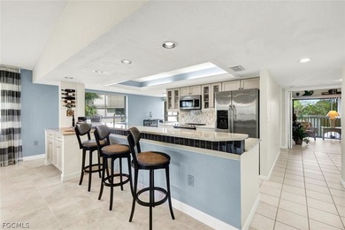 Steller Star Second Floor, Corner End Unit, With Lake & Golf on The Forest Country Club in Florida - for sale on GolfHomes.com, golf home, golf lot