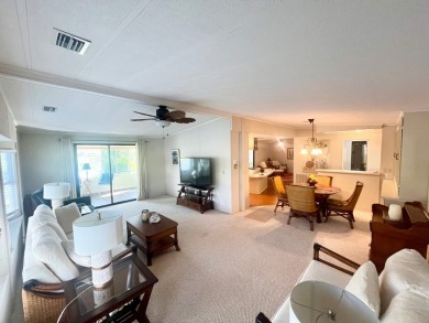 Welcome to this spacious 2-bedroom, 2-bath home located gated on Lake Fairways Country Club in Florida - for sale on GolfHomes.com, golf home, golf lot