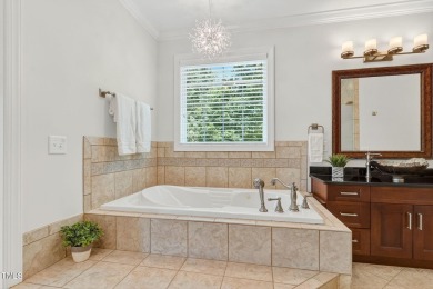 This custom-designed all brick estate on 1.2 acres offers nearly on Chicora Golf Course in North Carolina - for sale on GolfHomes.com, golf home, golf lot