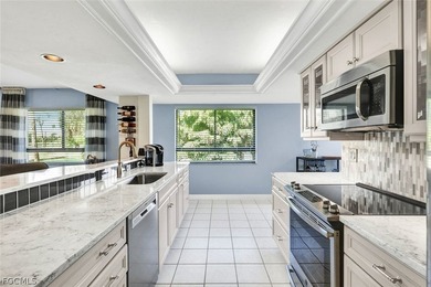 Steller Star Second Floor, Corner End Unit, With Lake & Golf on The Forest Country Club in Florida - for sale on GolfHomes.com, golf home, golf lot