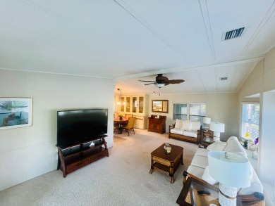 Welcome to this spacious 2-bedroom, 2-bath home located gated on Lake Fairways Country Club in Florida - for sale on GolfHomes.com, golf home, golf lot