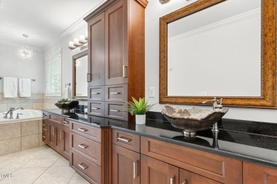 This custom-designed all brick estate on 1.2 acres offers nearly on Chicora Golf Course in North Carolina - for sale on GolfHomes.com, golf home, golf lot