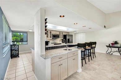 Steller Star Second Floor, Corner End Unit, With Lake & Golf on The Forest Country Club in Florida - for sale on GolfHomes.com, golf home, golf lot