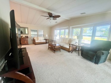 Welcome to this spacious 2-bedroom, 2-bath home located gated on Lake Fairways Country Club in Florida - for sale on GolfHomes.com, golf home, golf lot