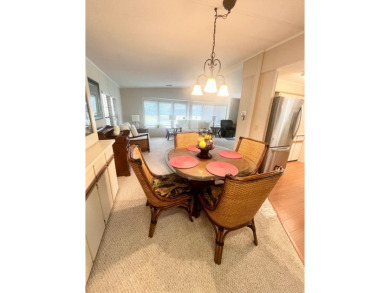 Welcome to this spacious 2-bedroom, 2-bath home located gated on Lake Fairways Country Club in Florida - for sale on GolfHomes.com, golf home, golf lot