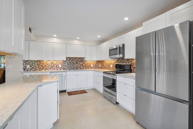 Welcome to this beautifully updated 3-bedroom, 2-bath 1st floor on Quail Ridge Golf Course and Country Club in Florida - for sale on GolfHomes.com, golf home, golf lot