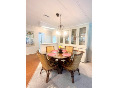 Welcome to this spacious 2-bedroom, 2-bath home located gated on Lake Fairways Country Club in Florida - for sale on GolfHomes.com, golf home, golf lot