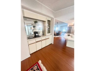 Welcome to this spacious 2-bedroom, 2-bath home located gated on Lake Fairways Country Club in Florida - for sale on GolfHomes.com, golf home, golf lot