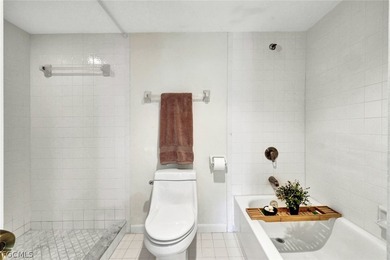 Steller Star Second Floor, Corner End Unit, With Lake & Golf on The Forest Country Club in Florida - for sale on GolfHomes.com, golf home, golf lot