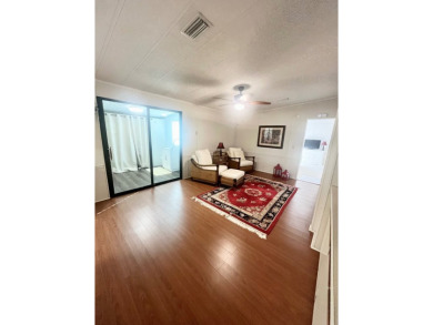 Welcome to this spacious 2-bedroom, 2-bath home located gated on Lake Fairways Country Club in Florida - for sale on GolfHomes.com, golf home, golf lot