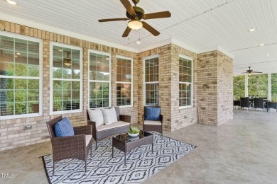 This custom-designed all brick estate on 1.2 acres offers nearly on Chicora Golf Course in North Carolina - for sale on GolfHomes.com, golf home, golf lot