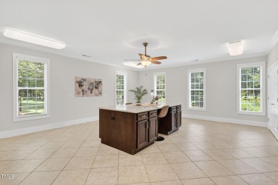 This custom-designed all brick estate on 1.2 acres offers nearly on Chicora Golf Course in North Carolina - for sale on GolfHomes.com, golf home, golf lot