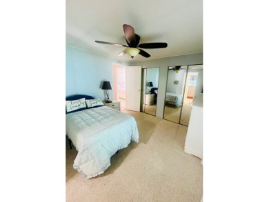 Welcome to this spacious 2-bedroom, 2-bath home located gated on Lake Fairways Country Club in Florida - for sale on GolfHomes.com, golf home, golf lot