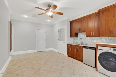 This custom-designed all brick estate on 1.2 acres offers nearly on Chicora Golf Course in North Carolina - for sale on GolfHomes.com, golf home, golf lot