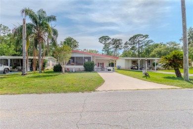 Nestled in the heart of Central Florida, this well-kept home in on Country Club of Mount Dora in Florida - for sale on GolfHomes.com, golf home, golf lot