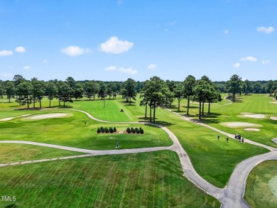 This custom-designed all brick estate on 1.2 acres offers nearly on Chicora Golf Course in North Carolina - for sale on GolfHomes.com, golf home, golf lot