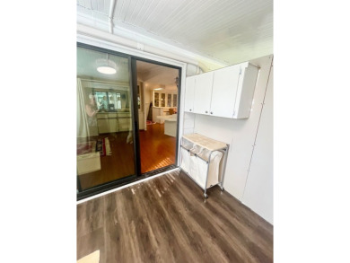 Welcome to this spacious 2-bedroom, 2-bath home located gated on Lake Fairways Country Club in Florida - for sale on GolfHomes.com, golf home, golf lot