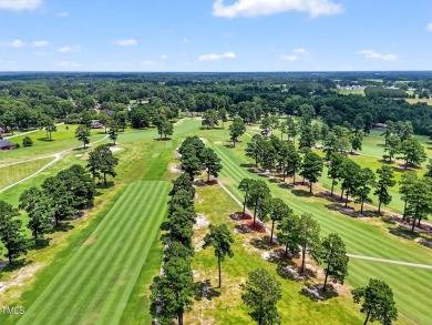 This custom-designed all brick estate on 1.2 acres offers nearly on Chicora Golf Course in North Carolina - for sale on GolfHomes.com, golf home, golf lot