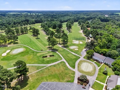 This custom-designed all brick estate on 1.2 acres offers nearly on Chicora Golf Course in North Carolina - for sale on GolfHomes.com, golf home, golf lot