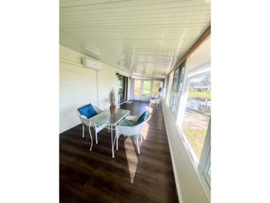 Welcome to this spacious 2-bedroom, 2-bath home located gated on Lake Fairways Country Club in Florida - for sale on GolfHomes.com, golf home, golf lot