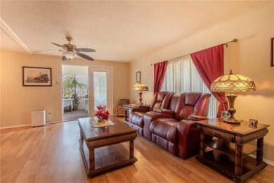 Nestled in the heart of Central Florida, this well-kept home in on Country Club of Mount Dora in Florida - for sale on GolfHomes.com, golf home, golf lot