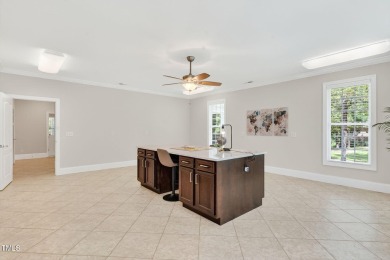 This custom-designed all brick estate on 1.2 acres offers nearly on Chicora Golf Course in North Carolina - for sale on GolfHomes.com, golf home, golf lot
