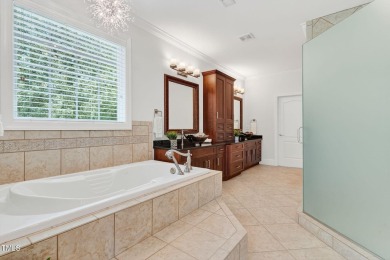 This custom-designed all brick estate on 1.2 acres offers nearly on Chicora Golf Course in North Carolina - for sale on GolfHomes.com, golf home, golf lot
