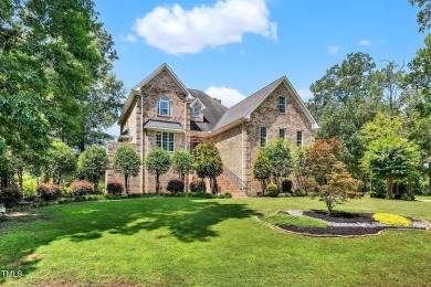 This custom-designed all brick estate on 1.2 acres offers nearly on Chicora Golf Course in North Carolina - for sale on GolfHomes.com, golf home, golf lot
