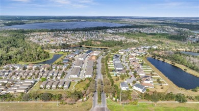 Welcome to 6921 Cupseed Ln in the Birchwood community, nestled on Harmony Golf Preserve in Florida - for sale on GolfHomes.com, golf home, golf lot