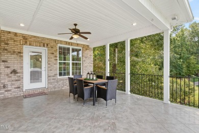 This custom-designed all brick estate on 1.2 acres offers nearly on Chicora Golf Course in North Carolina - for sale on GolfHomes.com, golf home, golf lot
